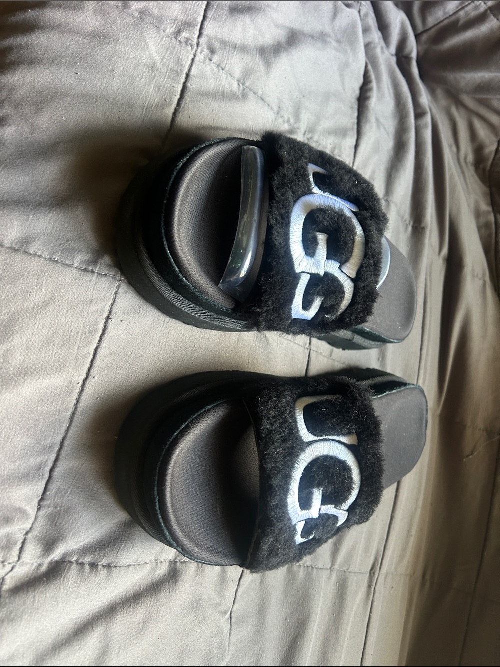 UGG Black Fuzzy Slide Sandals with White Logo